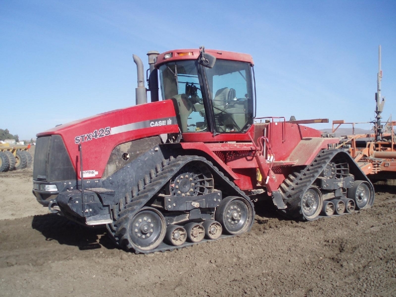 Case IH Quadtrac STX and 9300 Camoplast kāpurķēdes