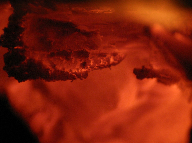 Lilastē degusi šķūņa ēka