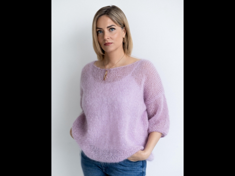 Elegants un mīksts trikotāžas džemperis.