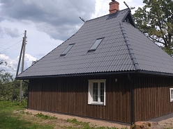 Koka mājas apdare