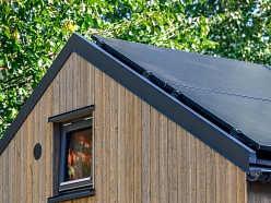 Koka mājas fasāde