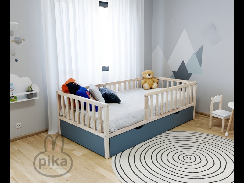 Bērnu gulta ar drošības barjeru